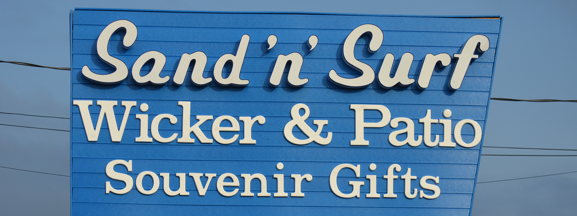 Sand 'n' Surf Wicker & Patio Souvenir Gifts Sign